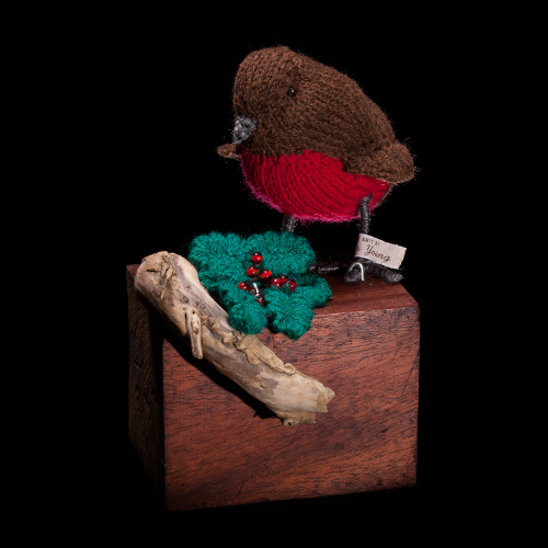 robin and holly on hardwood block